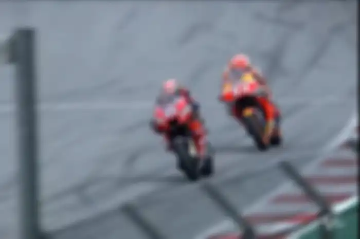 Momen ketika Andrea Dovizioso berhasil menyalip Marc Marquez di tikungan terakhir pada lap terkahir MotoGP Austria 2019.
