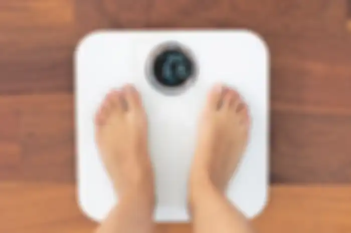 Ilustrasi timbangan Berat Badan