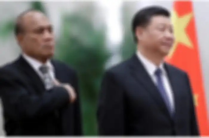 Presiden Kiribati Taneti Maamau berfoto dengan Presiden China Xi Jinping pada bulan Januari
