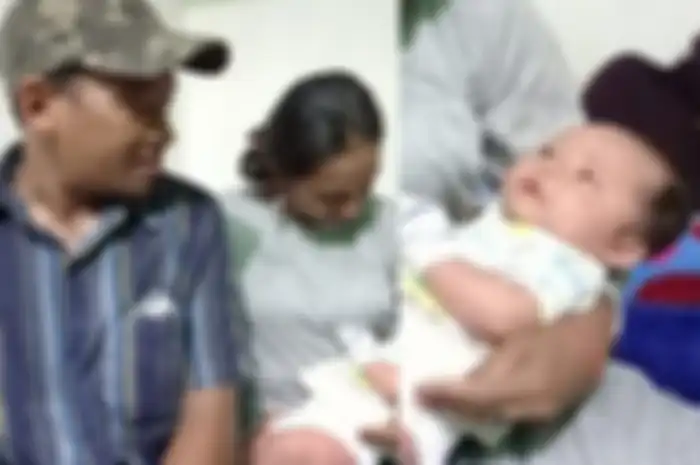 Pasangan suami istri, Andika Pratama dan Yanti dan bayinya Muhammad Aditya Pratama saat ditemui di rumah singgah Jalan Dr Soetomo, Samarinda, Kaltim, Kamis (3/9/2020)