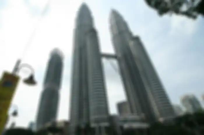 Menara Kembar Petronas di Kuala Lumpur, Malaysia, salah satu ikon di negara tersebut. 