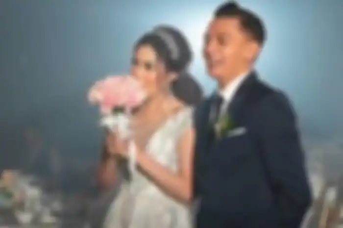 FOTO pernikahan Nella Kharisma dan Dory Harsa 