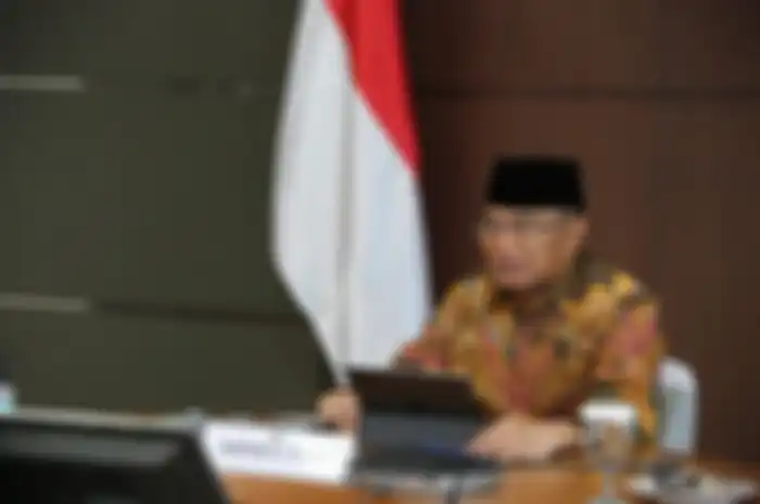 Menko PMK Muhadjir Effendy saat memimpin Rapat Tingkat Menteri Penetapan dan Penandatanganan SKB Hari Libur Nasional dan Cuti Bersama Tahun 2021 secara virtual, Kamis (10/9/2020).