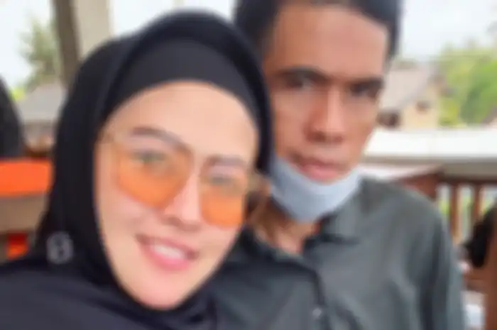 Meggy Wulandari dan suami