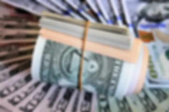 Ilustrasi uang dollar AS pada utang luar negeri Indonesia