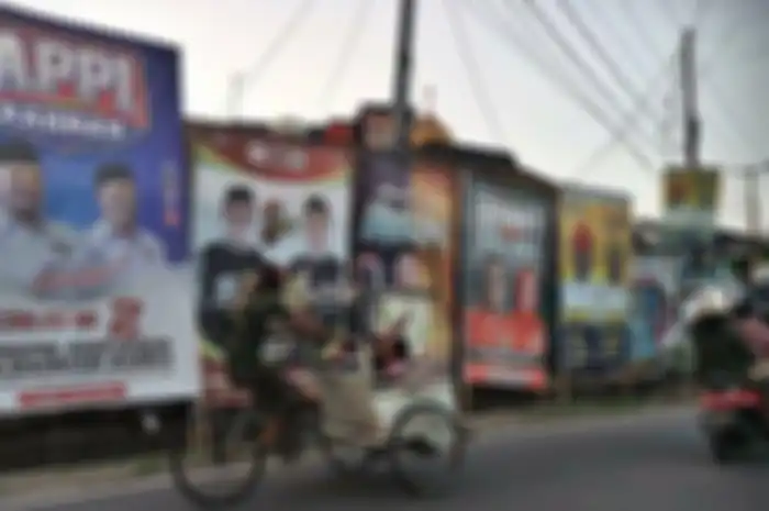 Ilustrasi baliho paslon Pilkada Makassar 2020 yang terpasang di sejumlah ruas jalan dikutip tribunnews
