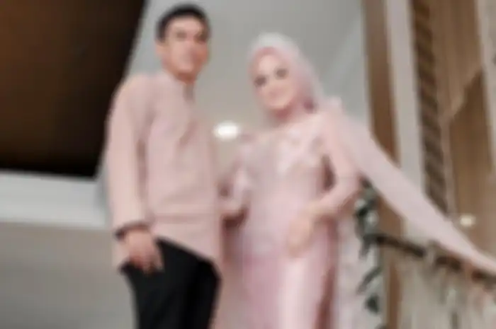 Meggy Wuladari dan sang suami