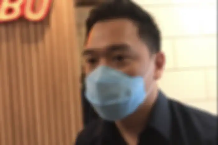 Michael Yukinobu de Fretes saat mendatangi Subdit Cryber Crime Polda Metro Jaya, Senin (11/1/2021).