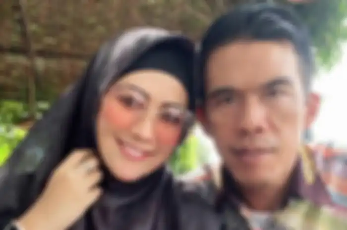 Meggy Wulandari dan suami barunya