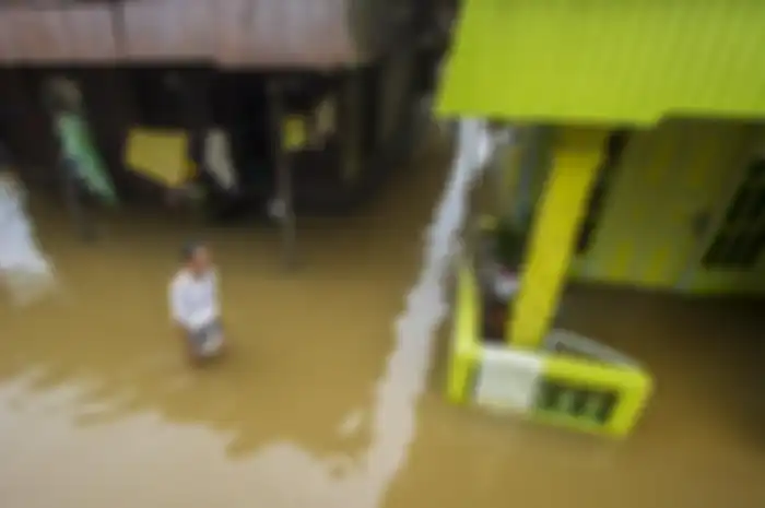 Ilustrasi banjir di permukiman. 