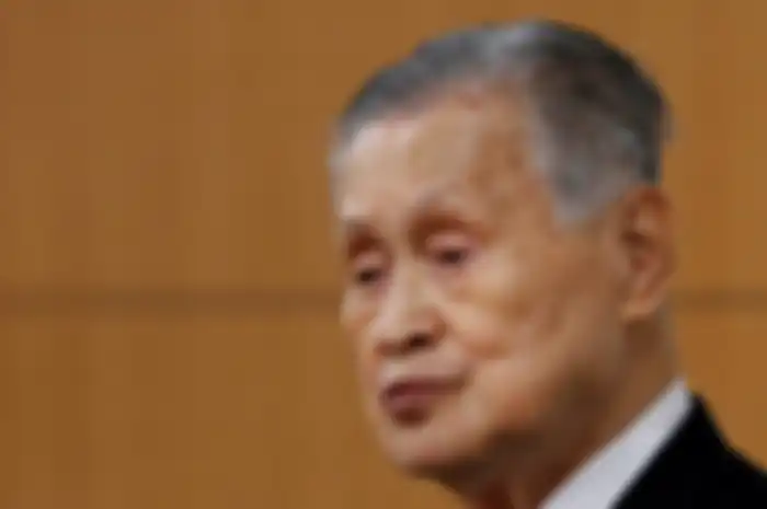 FILE PHOTO: Tokyo 2020 president Yoshiro Mori listens a question from a journalist at a news conference in Tokyo, Japan, February 4, 2021. REUTERS/Kim Kyung-Hoon/Pool/File Photo