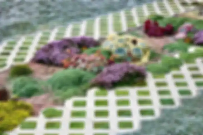 Ilustrasi-Paving block bunga di taman, memungkinkan ada resapan air. 