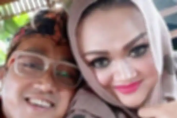 Teddy dan Alm. Lina Jubaedah