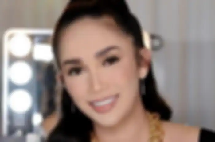  Ussy Sulistiawaty
