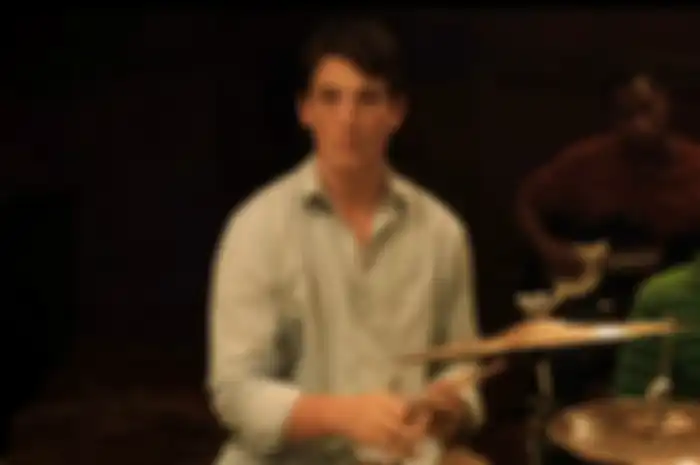 Miles Teller dalam film Whiplash