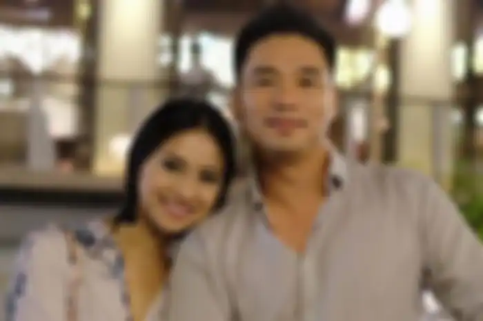 Rini Yulianti dan suami