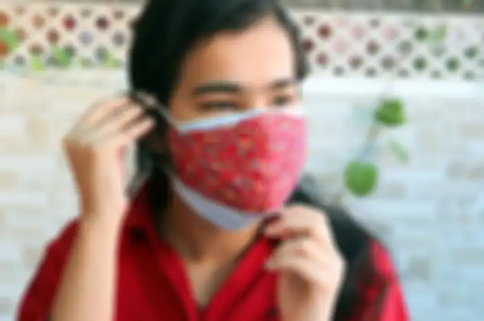Pemakaian double masker