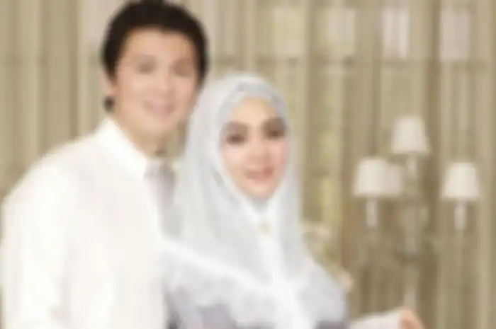 Syahrini dan Reino Barack