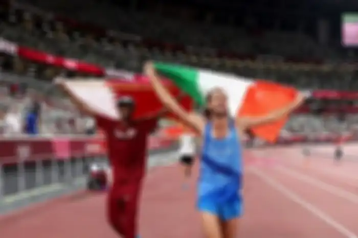 Mutaz Essa Barshim (Qatar) dan Gianmarco Tamberi (Italia), berbagi medali emas di Olimpiade Tokyo 2020.