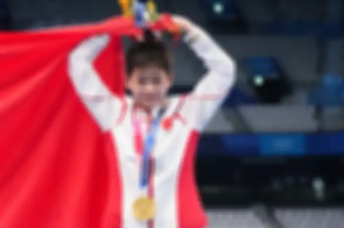 Quan Hongchan, atlet muda China yang meraih medali emas.