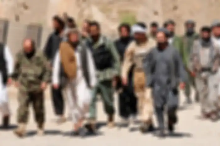 Pemberontak Taliban menyerahkan diri ke Pasukan Keamanan Nasional Afghanistan di pangkalan operasi depan di Puza-i-Eshan pada 23 April 2010. Pembelotan mereka terjadi di tengah-tengah Operasi Taohid II, dan operasi yang dipimpin Afghanistan.   