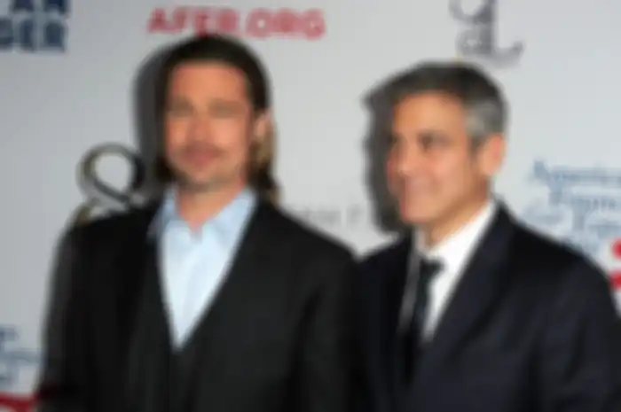 Brad Pitt (kiri) dan George Clooney (kanan)