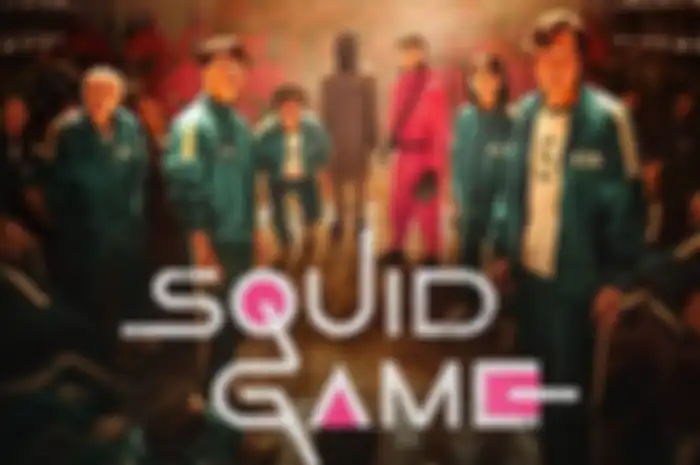 Para tokoh dalam Squid Game memakai kostum yang mencolok.