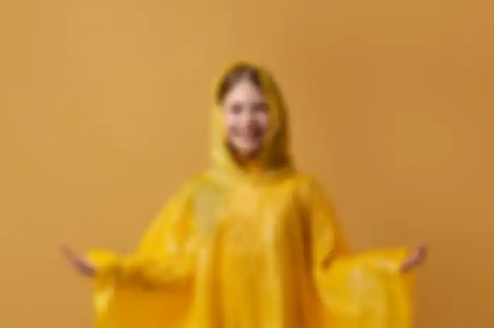 Membersihkan Jas Hujan