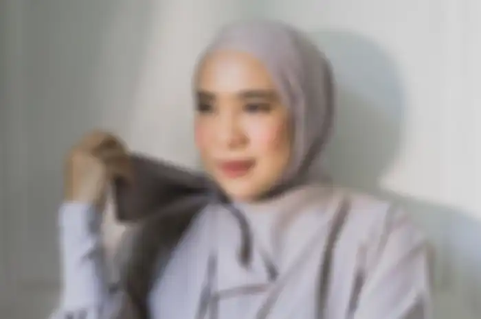 Potret Fitri Tropica presenter kondang sekaligus penyiar radio.