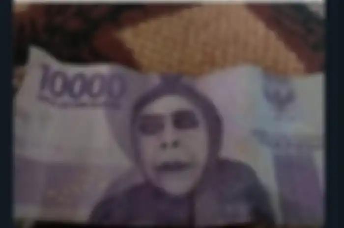Postingan yang nunjukkin selembar uang kertas pecahan Rp10.000 dicoret-coret.