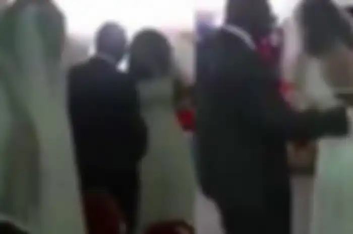 Pengantin pria menenangkan wanita simpanannya yang datang ke pesta pernikahan 