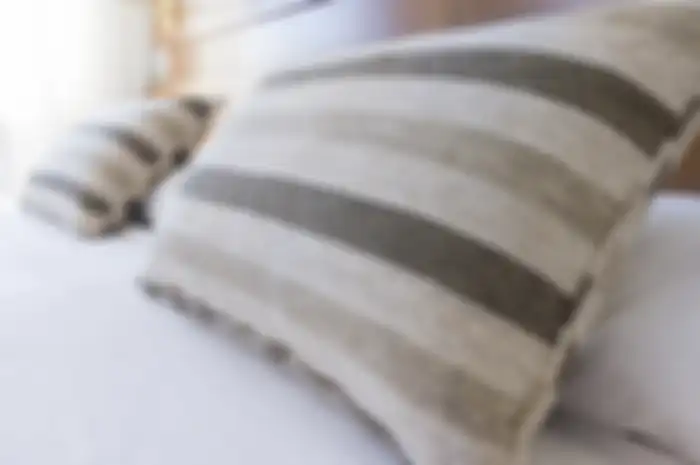 Mencuci bantal dengan mesin cuci