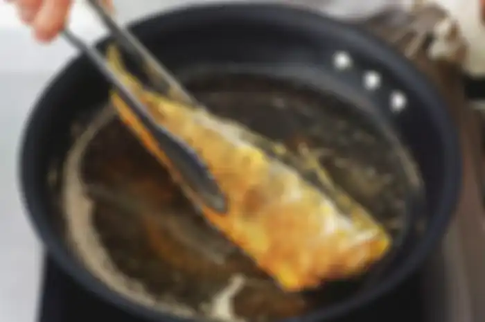 Ilustrasi goreng ikan