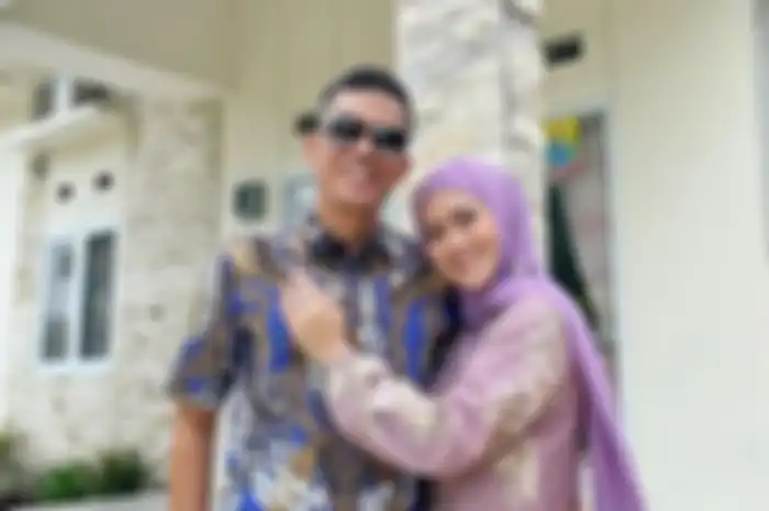 Meggy Wulandari dan suami barunya
