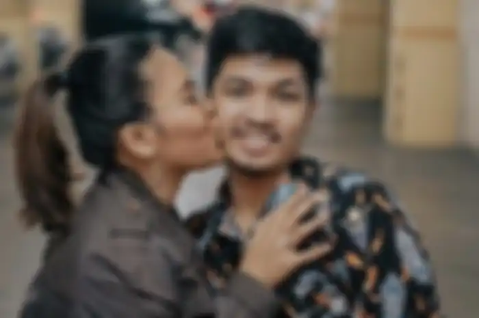 Evi Masamba dan suami