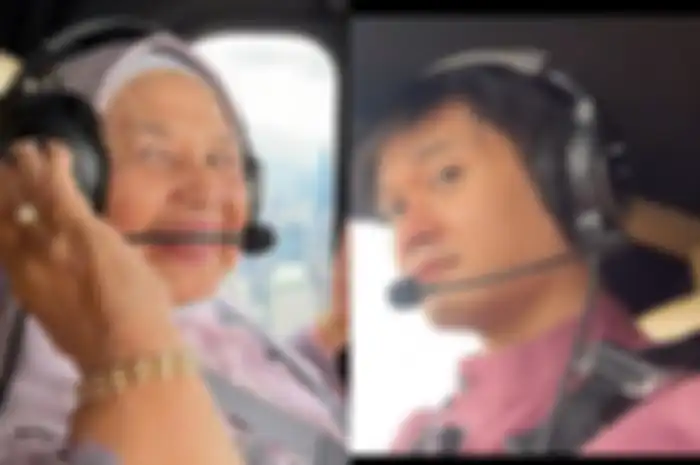 Nubhan saat mengajak ibunya keliling kota naik helikopter
