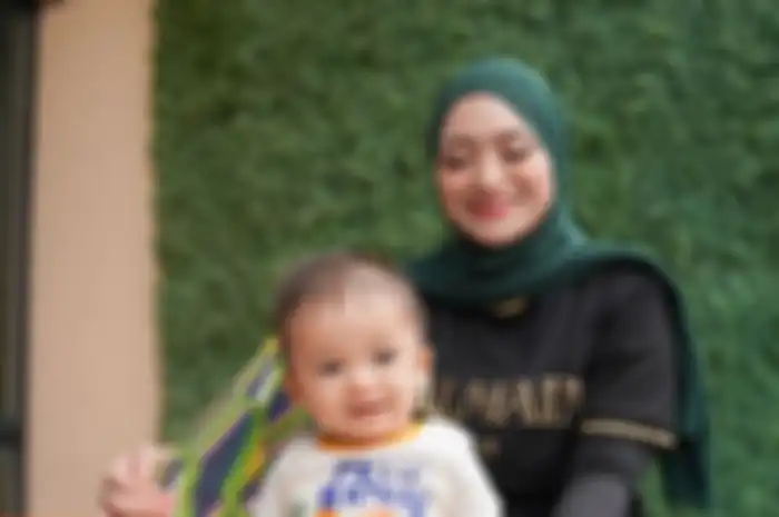 Nathalie Holscher dan Adzam.