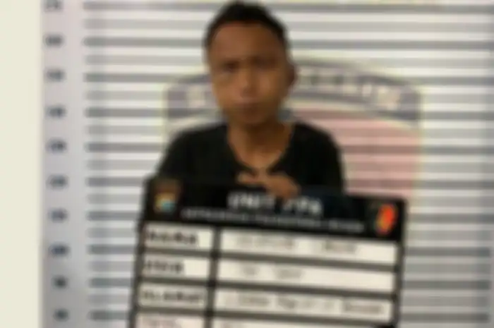 Yusrendi Siregar, pengamen yang merupakan pelaku pelecehan siswi SMA di angkot setelah diamankan polisi.