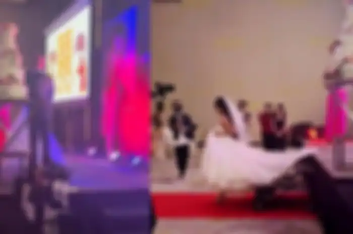 Pengantin wanita berlari meninggalkan pengantin pria di atas panggung