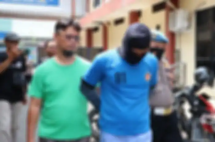 Tersangka AS (29), pelaku pembunuhan seorang wanita asal Depok yang mayatnya dibuang dalam karung di wilayah Gunungputri, Kabupaten Bogor. 