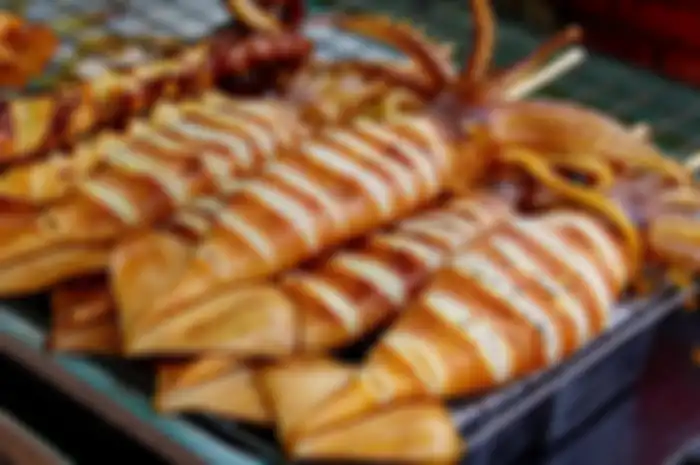 Ilustrasi cumi-cumi bakar. 