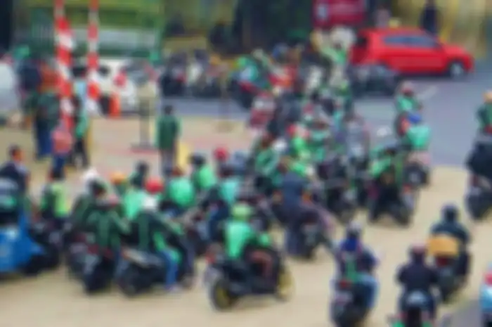Ilustrasi driver ojol alias ojek online.