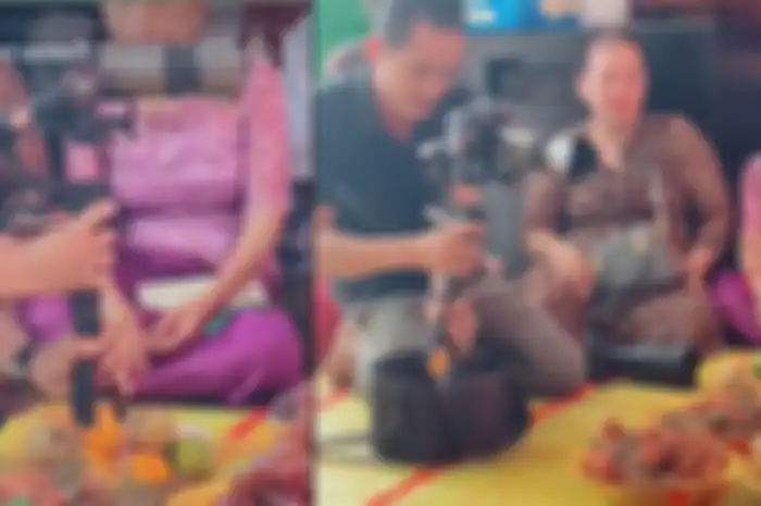 Pria itu juga melakukan hal yang sama untuk mengambil buah jeruk yang ada di depannya.