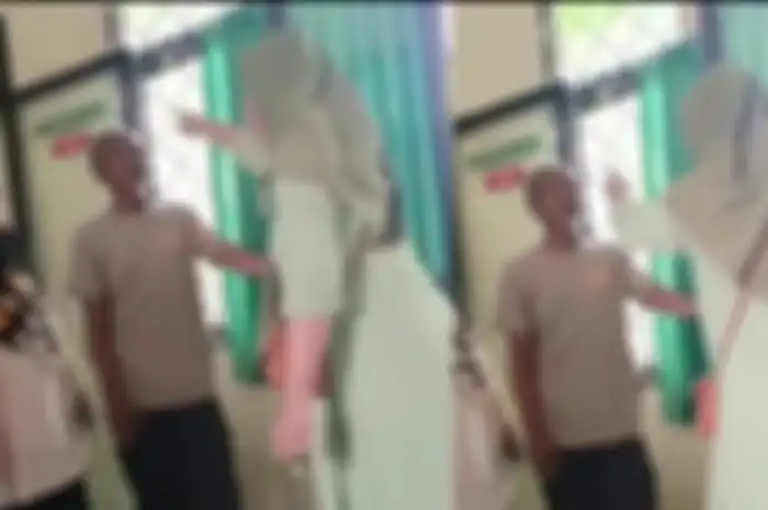 Emak-emak marahi satpam sekolah.