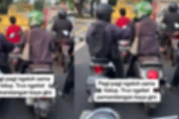 Sang lelaki mengambil jalur ke arah kiri, sementara pengendara wanita berjalan ke arah lurus.