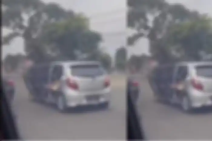 Aksi wanita teriak minta tolong dari dalam mobil di jalan raya viral.