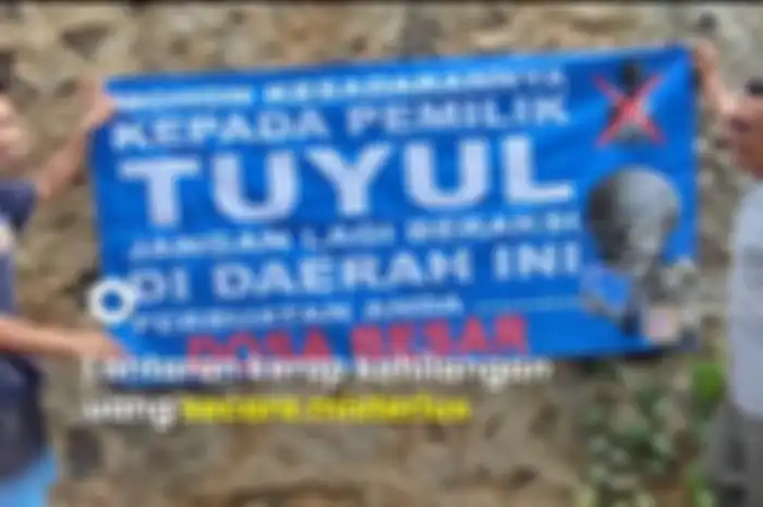 Warga pasang spanduk lantaran resah uang hilang digondol tuyul.