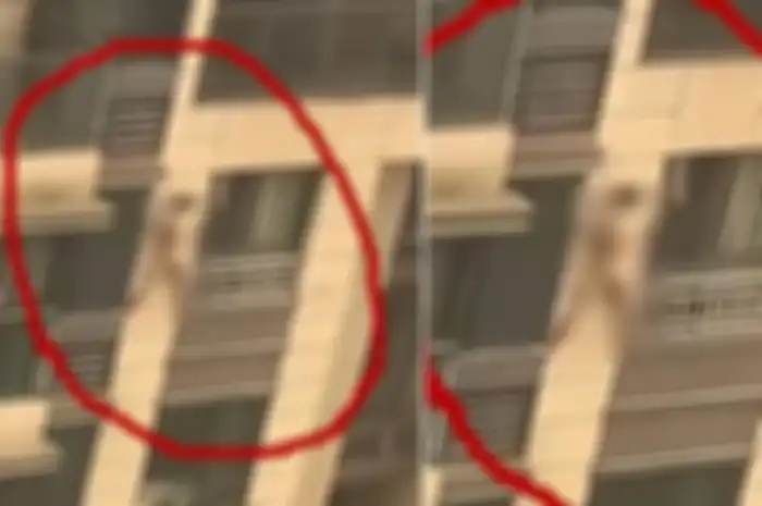 Pria di China melarikan diri ke dinding gedung bertingkat saat suami selingkuhannya datang.