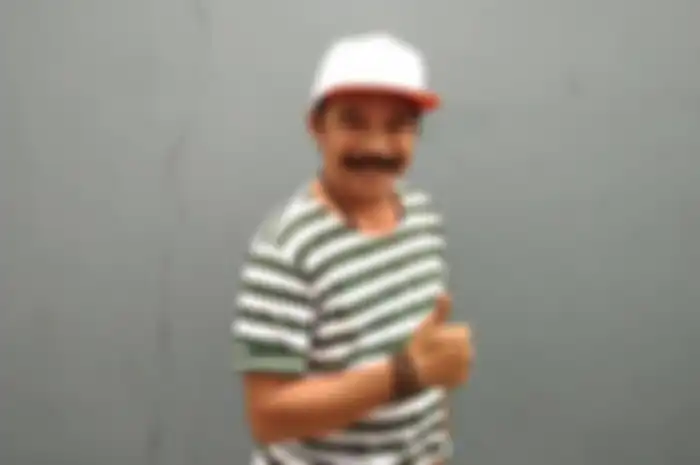 Pelawak kondang Opie Kumis.