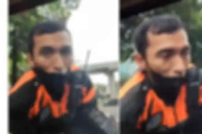  Kondisi petugas Dishub Jakarta yang naik kap mesin mobil.    
